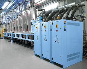 Moretto, NPE 2018, mezcladora gravimétrica gravix, controlador de temperatura Teko, sistema de secado Eureka Plus, transporte de resina, trasnformadores, plásticos